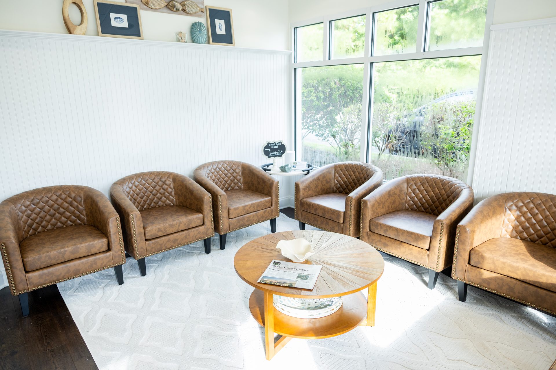 The waiting area at Belfast River Dental — natural light, comfortable seating